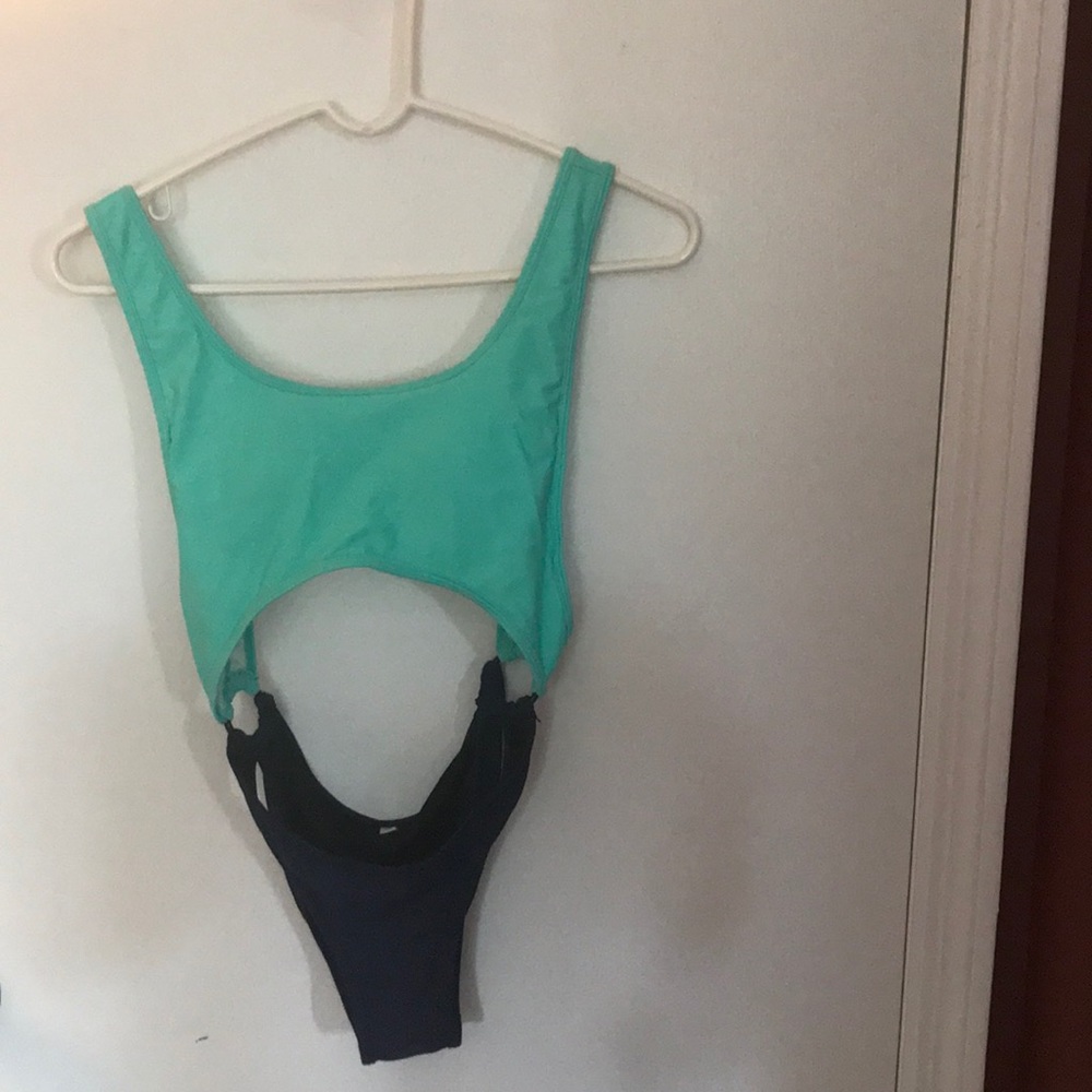 One piece bathing suit with open midsection
